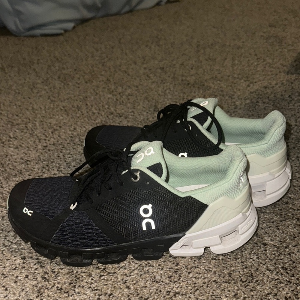 On Running Black and White Sneakers